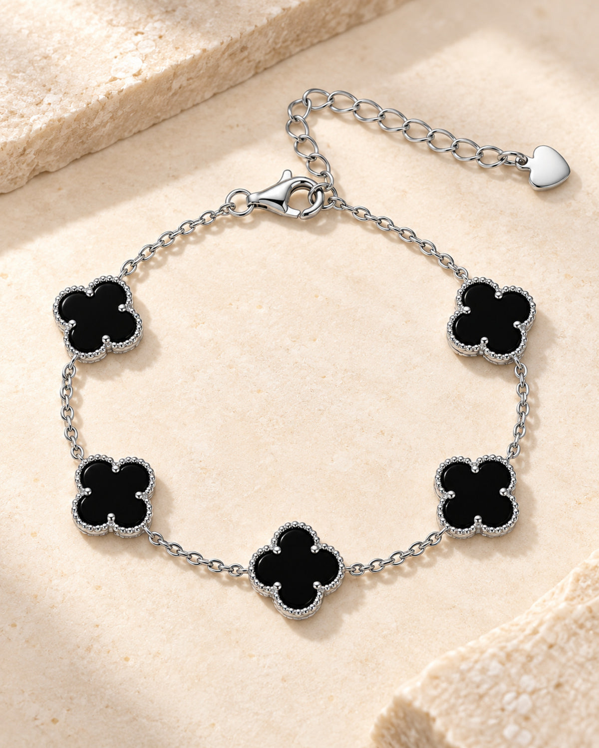 Silver-tone five-clover bracelet with black onyx centres