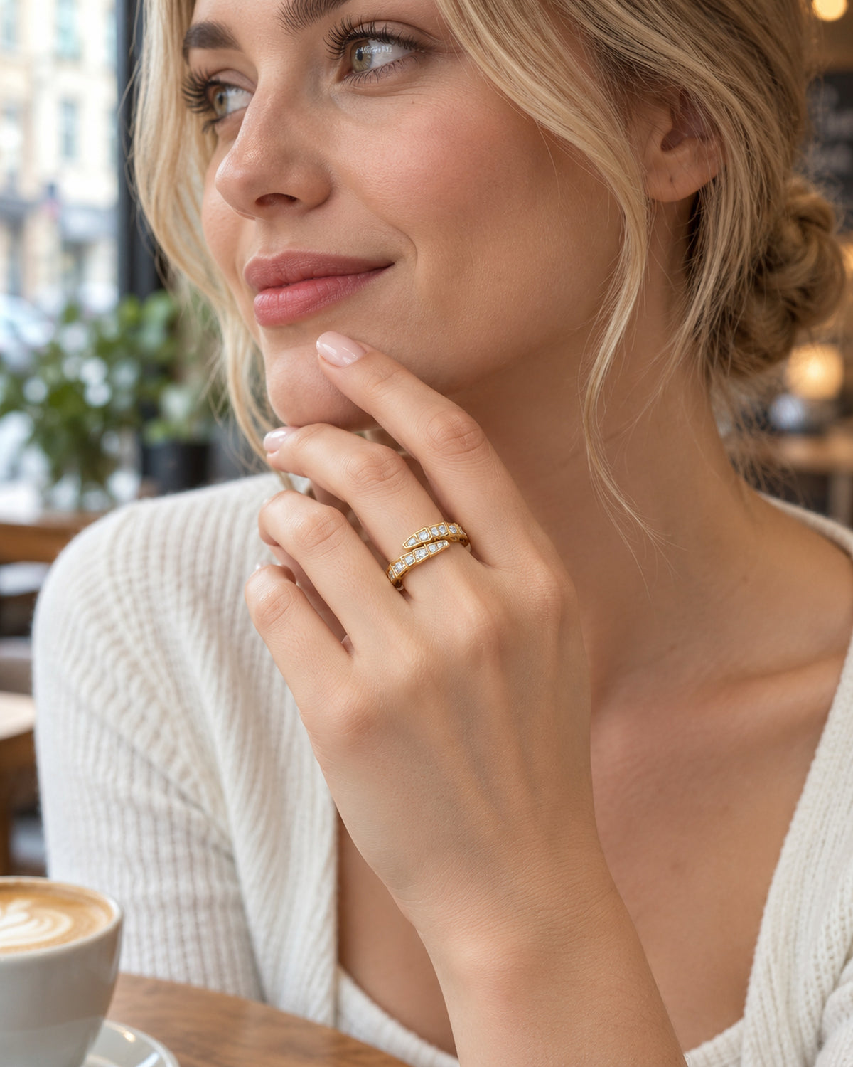 Woman wearing 14K gold tone moissanite snake ring