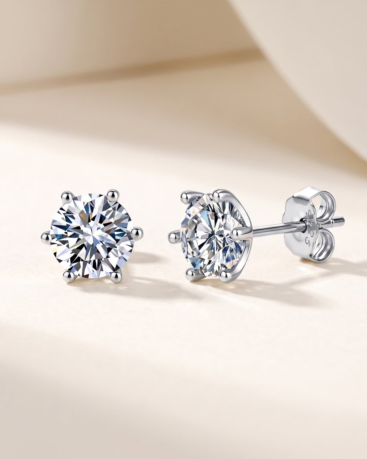 Silver-tone six-prong round moissanite stud earrings in S925 sterling silver