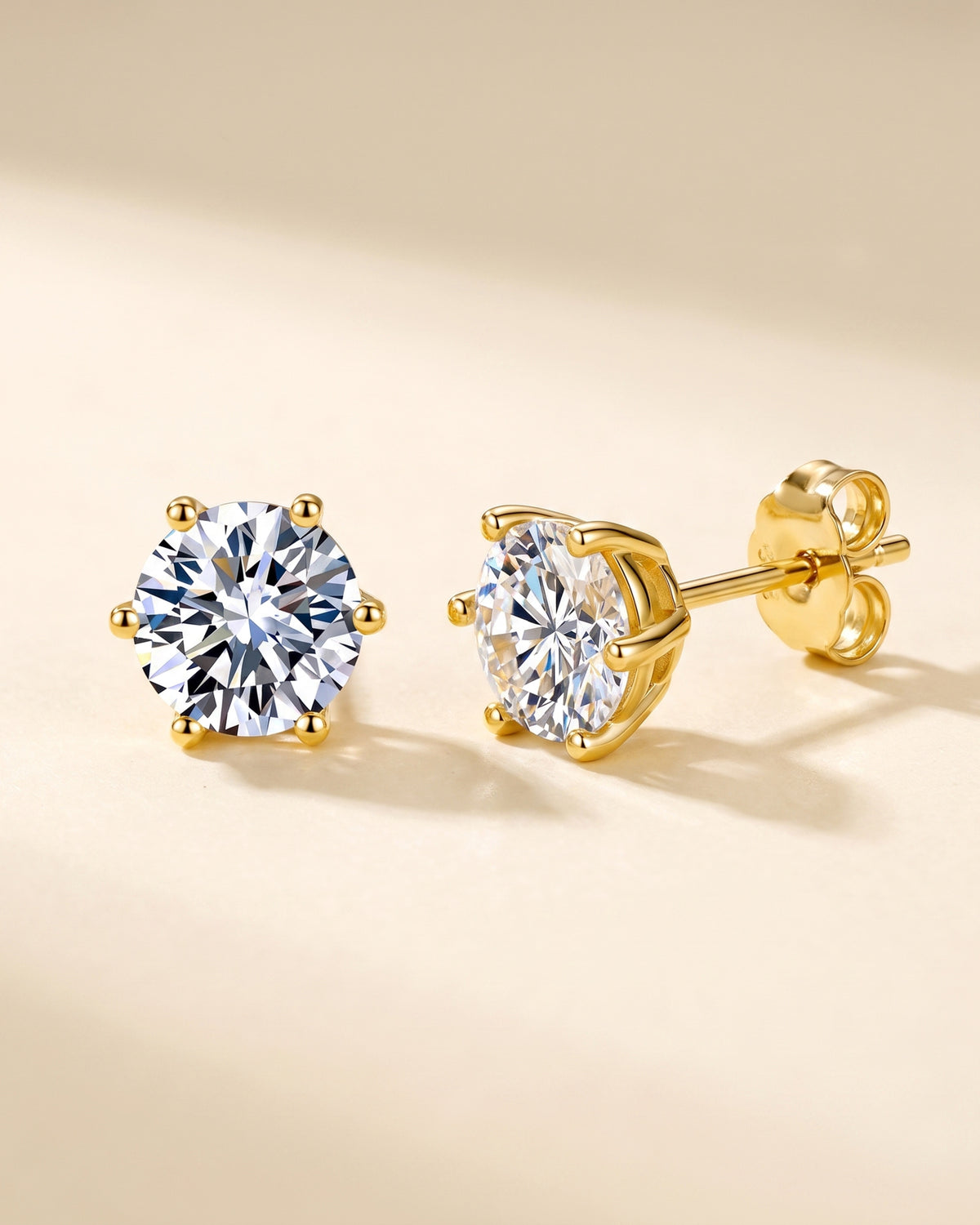 Gold-tone six-prong round moissanite stud earrings in S925 sterling silver