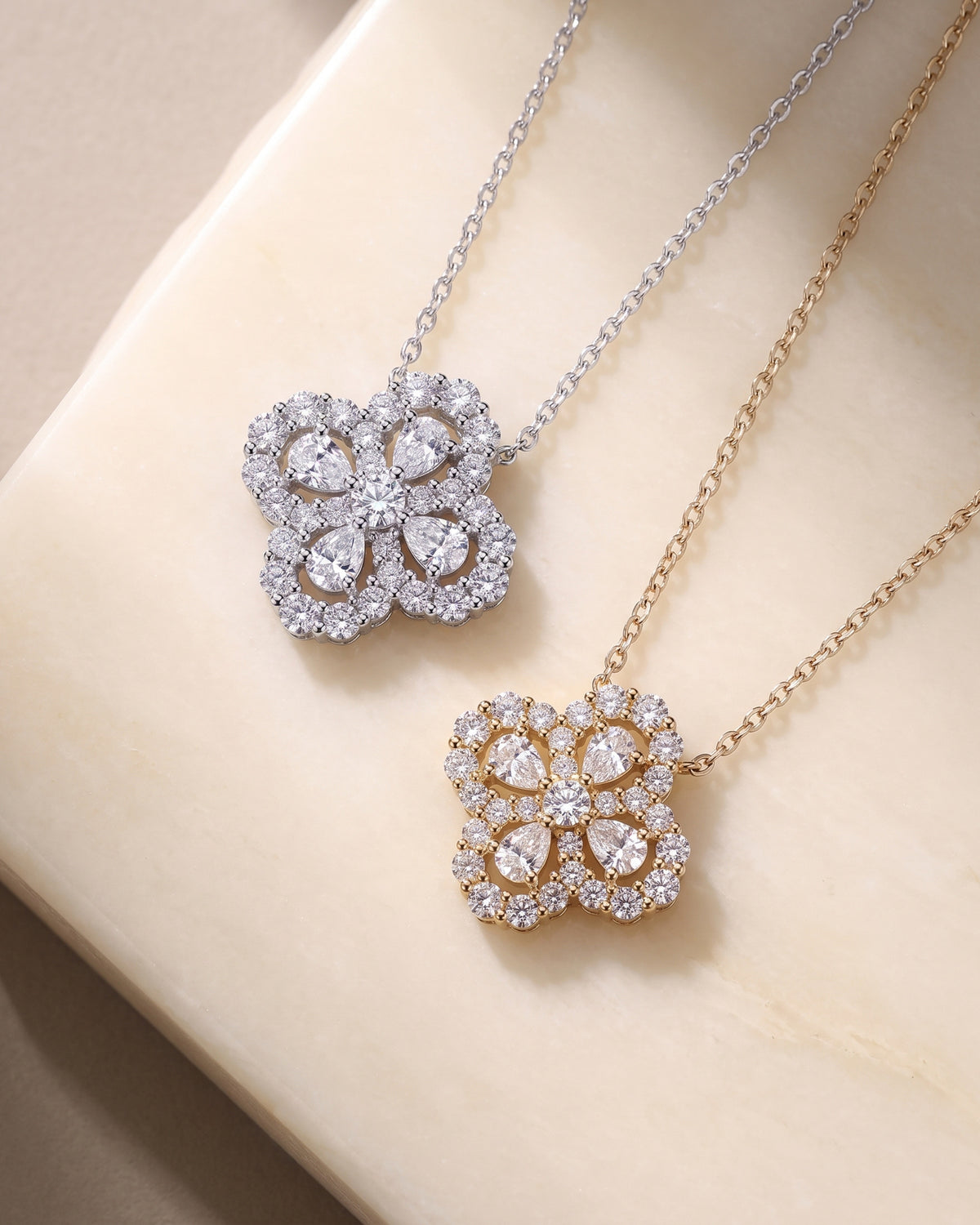 Moissanite four-leaf clover necklaces in silver-tone and gold-tone finishes