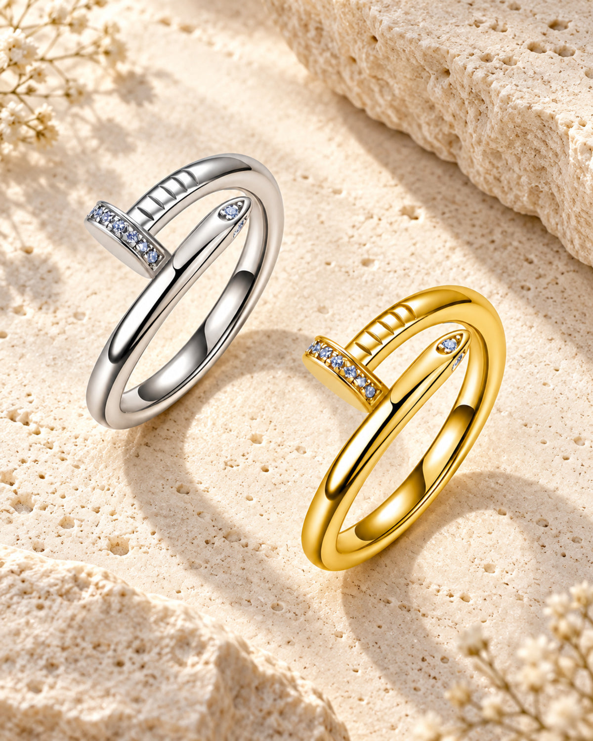 Silver and gold-tone moissanite nail rings lifestyle flat lay