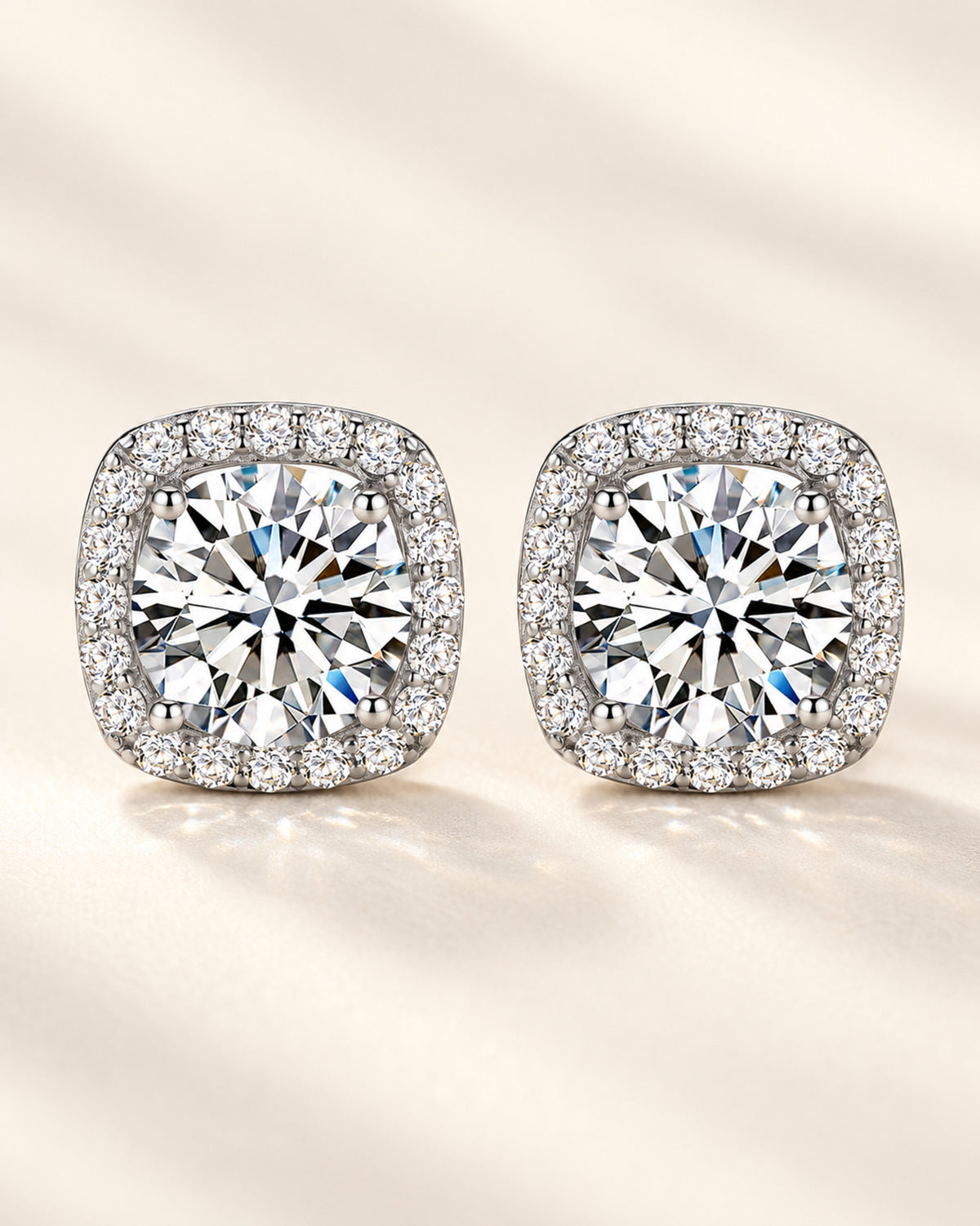Women's silver moissanite halo stud earrings in S925 sterling silver, front view