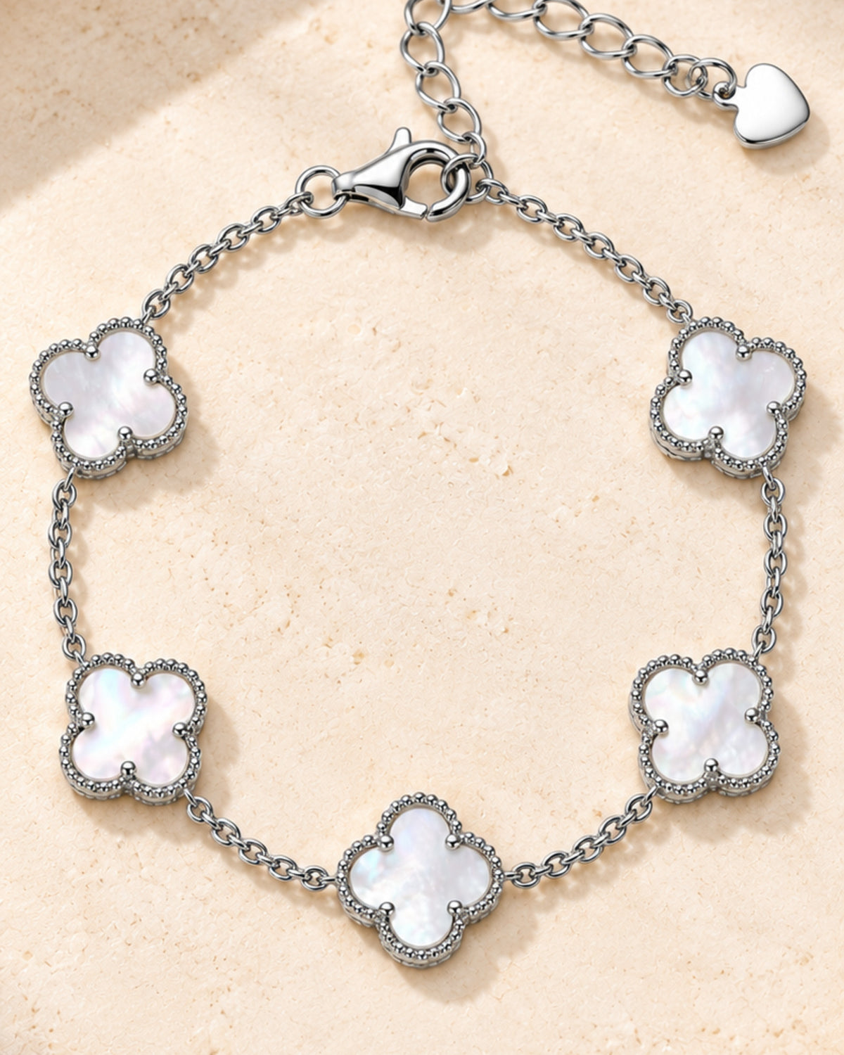 Silver-tone five-clover bracelet with white shell centres
