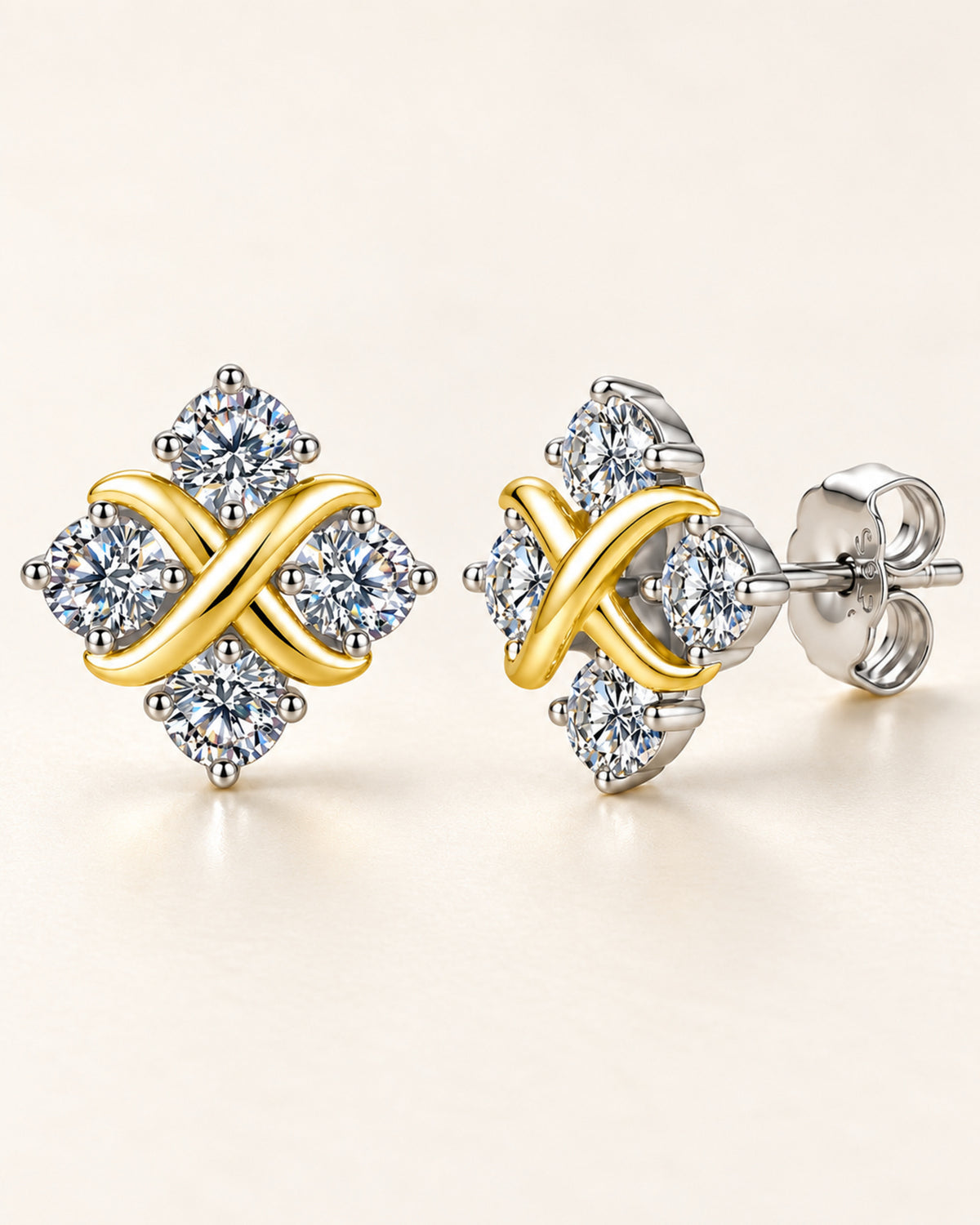 Macro view of four-stone moissanite crossover stud earrings