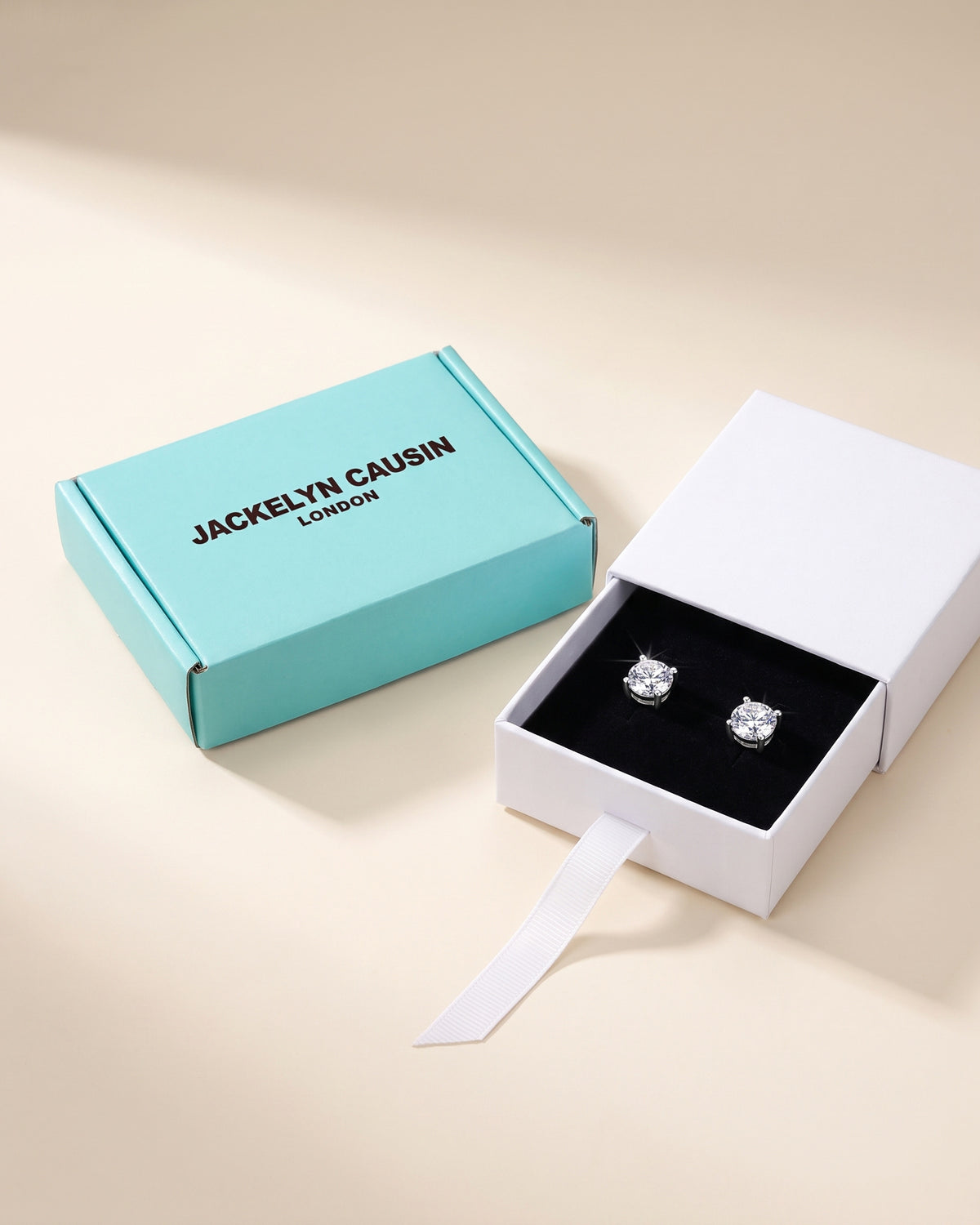 Moissanite stud earrings with JACKELYN CAUSIN jewellery packaging