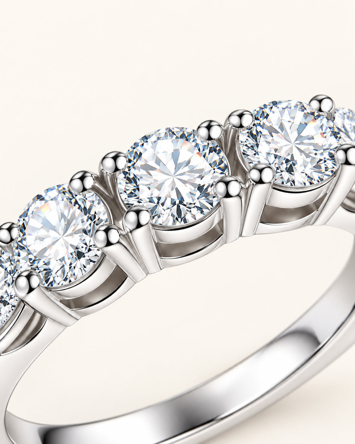 Round-cut moissanite stones and four-prong setting close-up