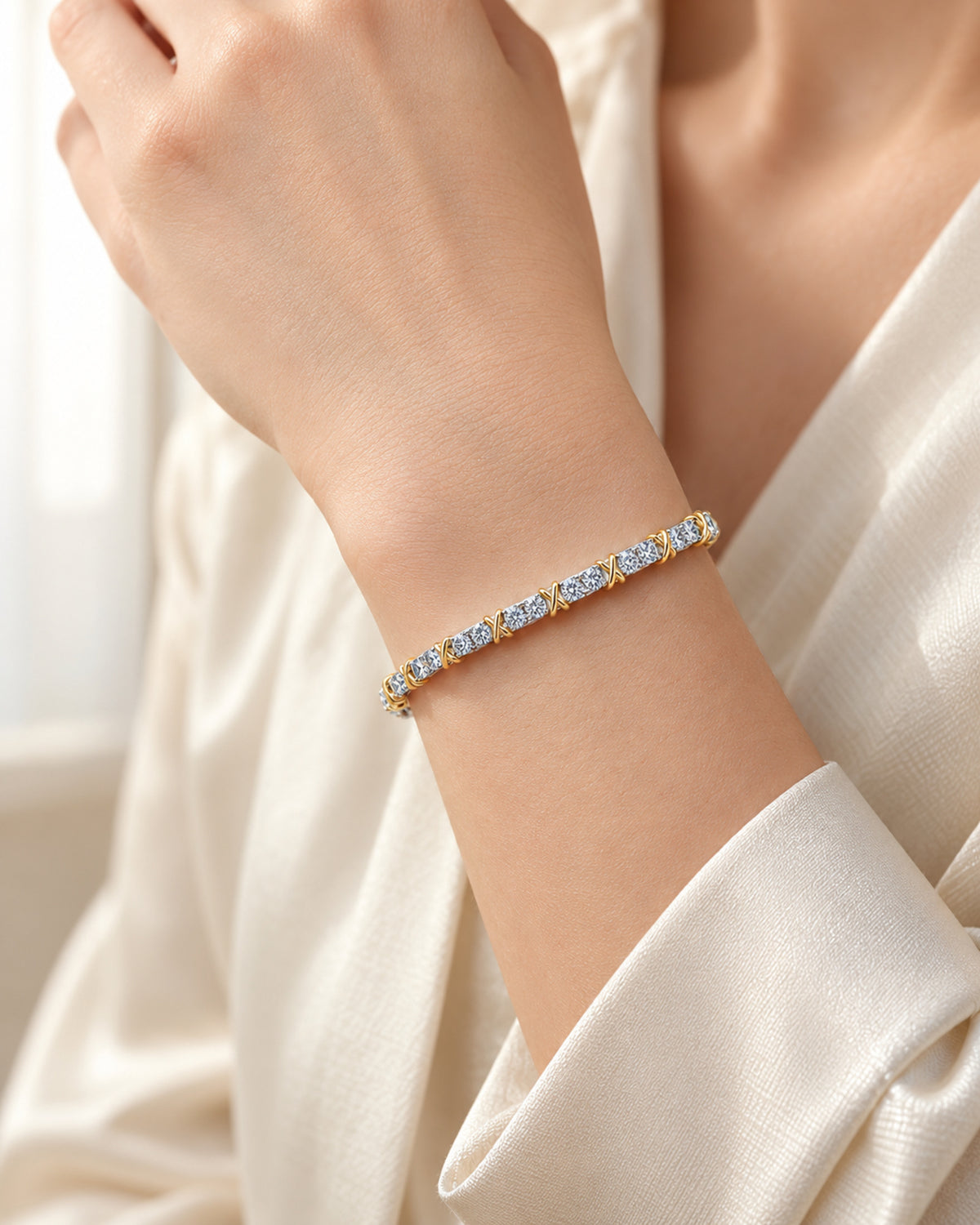 Woman wearing a two-tone moissanite tennis bracelet