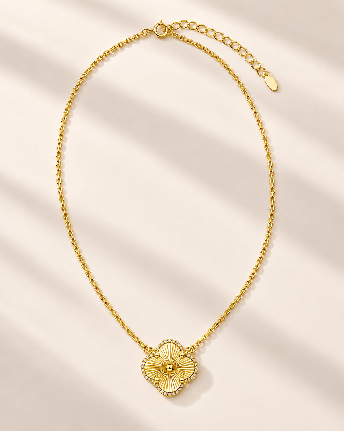 Women's moissanite four-leaf clover necklace in 14K gold tone
